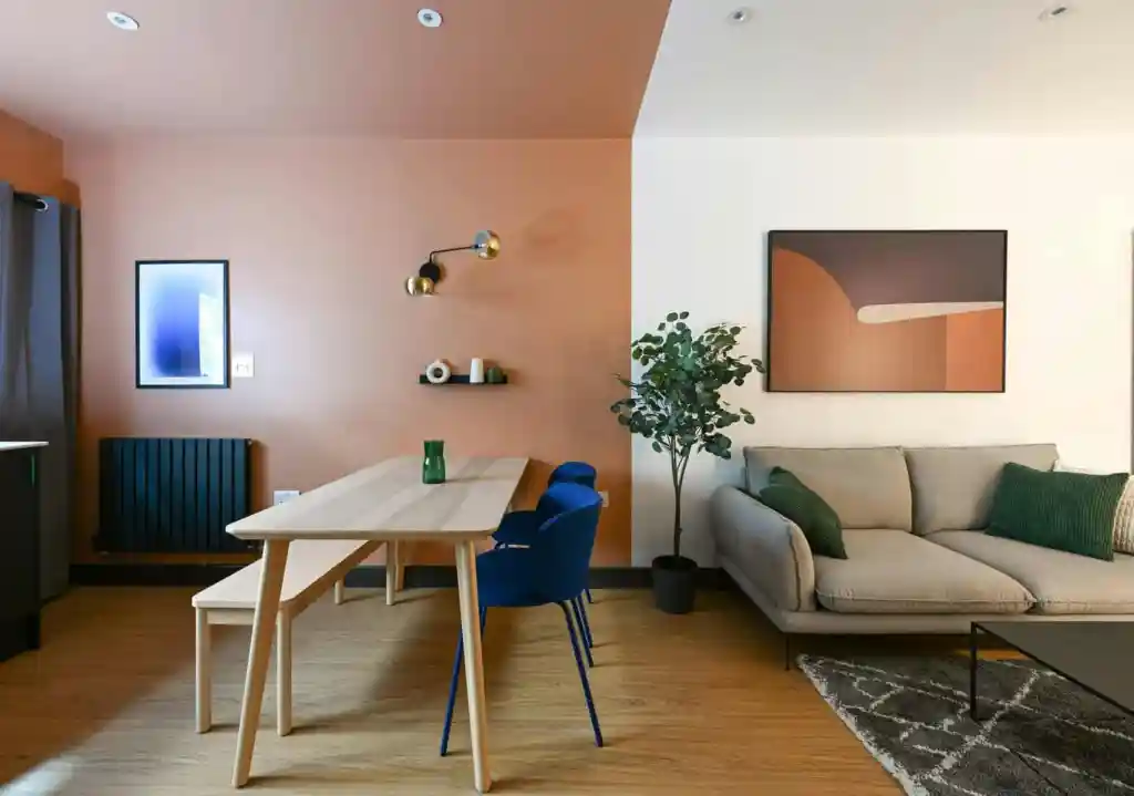 Contemporary living and dining space with stylish decor and cozy seating.