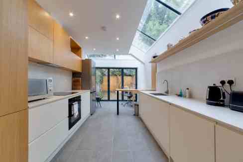 Contemporary kitchen with natural light and minimalist design.