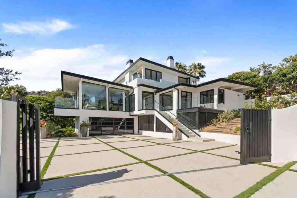 Contemporary luxury villa with large glass windows and modern design in Malibu.