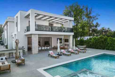 Luxury modern villa with pool and outdoor lounge area in Los Angeles.