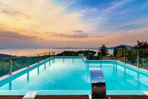 Infinity pool overlooking the ocean at sunset, Sorrento Arabesca Villa.