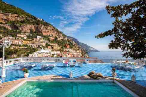 Luxury villa with infinity pool overlooking Positano coast.