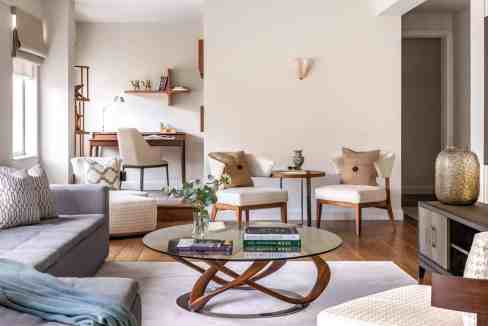 Bright and stylish living room with comfortable seating and decor.