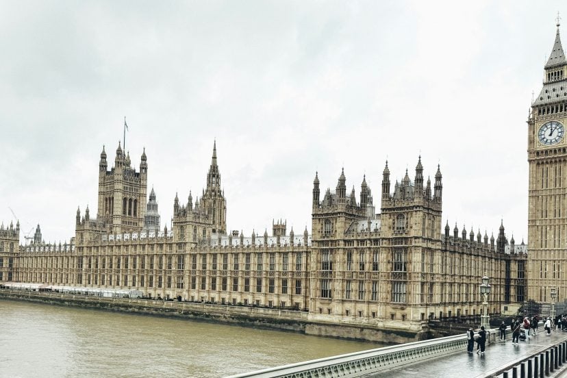 View of the Houses of Parliament and Big Ben in London from the River Thames.